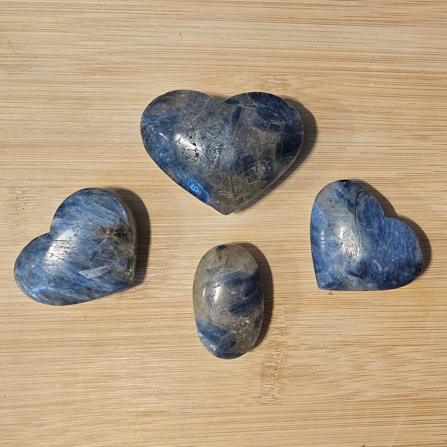 Blue Kyanite hearts and palm stone