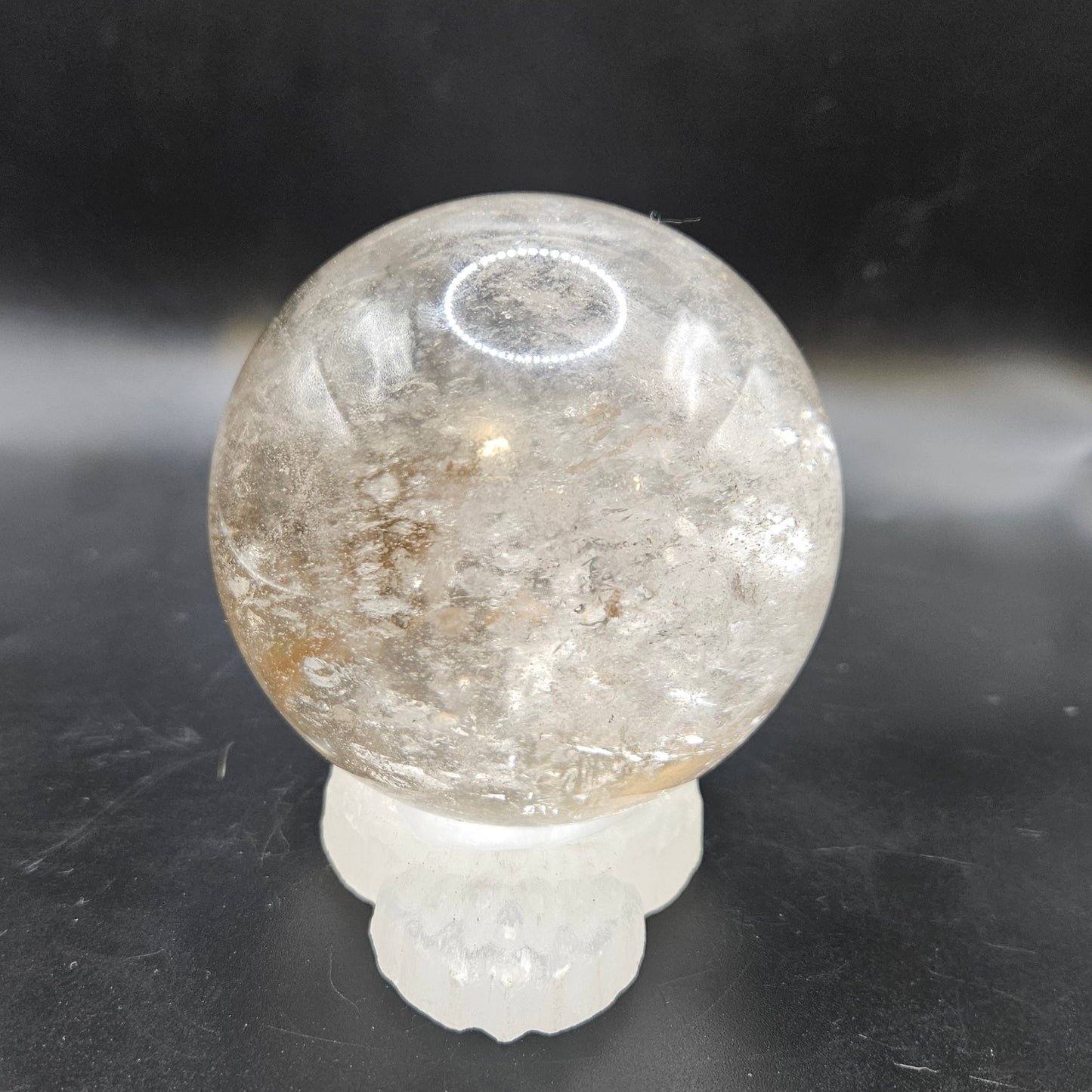 Clear Quartz sphere with rainbows, Golden Healer, and Black Tourmaline